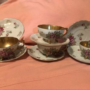 Set 4 porcelain cups and 2 additional dishes